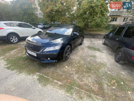 Серый Тойота Камри, объемом двигателя 2.49 л и пробегом 200 тыс. км за 14300 $, фото 1 на Automoto.ua