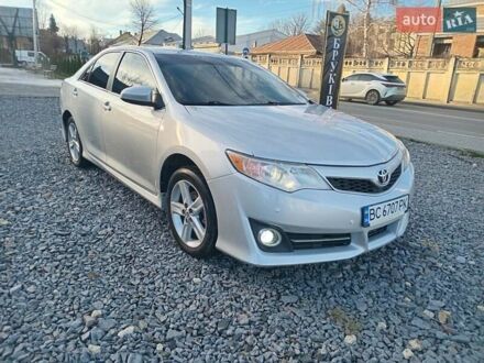 Серый Тойота Камри, объемом двигателя 2.49 л и пробегом 230 тыс. км за 9800 $, фото 1 на Automoto.ua