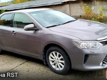 Серый Тойота Камри, объемом двигателя 2.5 л и пробегом 134 тыс. км за 10000 $, фото 1 на Automoto.ua