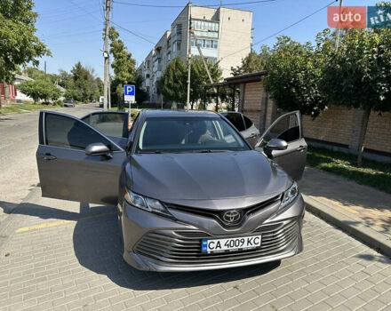Серый Тойота Камри, объемом двигателя 2.49 л и пробегом 99 тыс. км за 18900 $, фото 1 на Automoto.ua