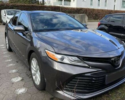 Серый Тойота Камри, объемом двигателя 2.5 л и пробегом 100 тыс. км за 17700 $, фото 1 на Automoto.ua