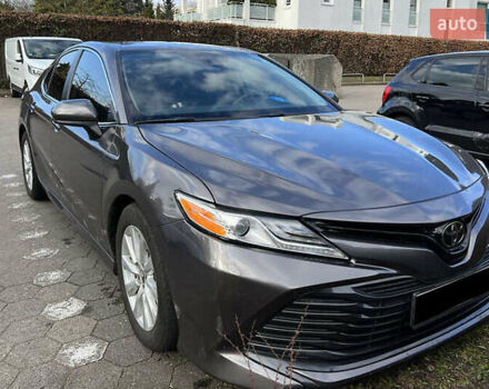 Серый Тойота Камри, объемом двигателя 2.49 л и пробегом 100 тыс. км за 19700 $, фото 1 на Automoto.ua