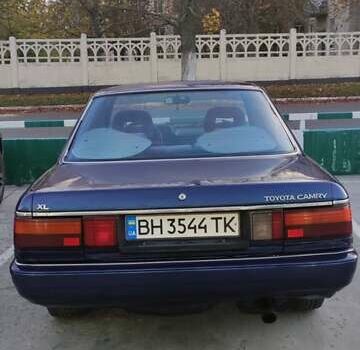 Синий Тойота Камри, объемом двигателя 2 л и пробегом 380 тыс. км за 1800 $, фото 11 на Automoto.ua