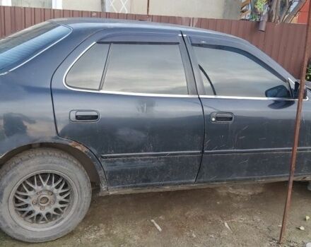 Синий Тойота Камри, объемом двигателя 2.2 л и пробегом 646 тыс. км за 1500 $, фото 5 на Automoto.ua