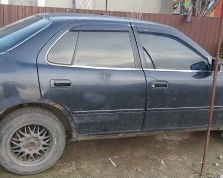 Синий Тойота Камри, объемом двигателя 2.2 л и пробегом 646 тыс. км за 1500 $, фото 4 на Automoto.ua