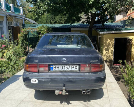 Синий Тойота Камри, объемом двигателя 2.96 л и пробегом 362 тыс. км за 1750 $, фото 1 на Automoto.ua
