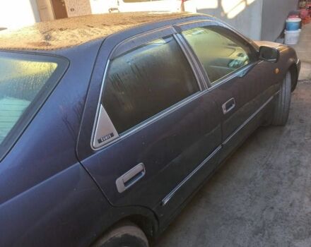 Синій Тойота Камрі, об'ємом двигуна 3 л та пробігом 390 тис. км за 2550 $, фото 3 на Automoto.ua