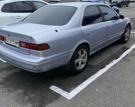 Синий Тойота Камри, объемом двигателя 3 л и пробегом 300 тыс. км за 3000 $, фото 1 на Automoto.ua