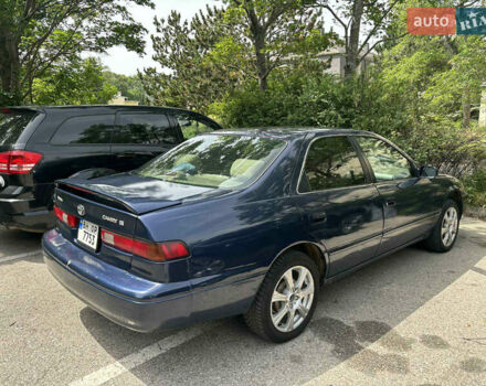 Синий Тойота Камри, объемом двигателя 2.16 л и пробегом 250 тыс. км за 2999 $, фото 3 на Automoto.ua