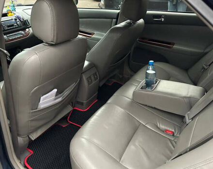 Синий Тойота Камри, объемом двигателя 2.4 л и пробегом 233 тыс. км за 5200 $, фото 6 на Automoto.ua