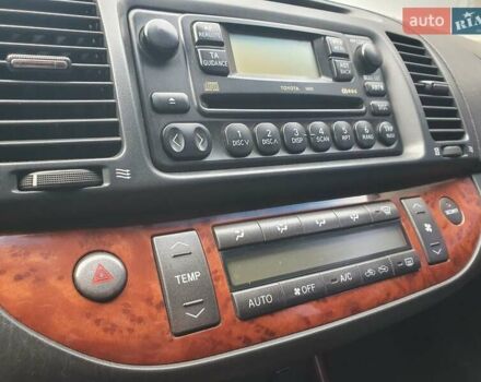 Синий Тойота Камри, объемом двигателя 2.4 л и пробегом 300 тыс. км за 4900 $, фото 31 на Automoto.ua