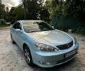Синий Тойота Камри, объемом двигателя 3 л и пробегом 350 тыс. км за 6800 $, фото 1 на Automoto.ua