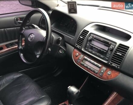 Синій Тойота Камрі, об'ємом двигуна 3 л та пробігом 265 тис. км за 7200 $, фото 44 на Automoto.ua