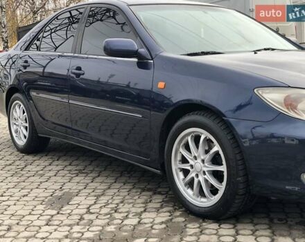 Синій Тойота Камрі, об'ємом двигуна 3 л та пробігом 265 тис. км за 7200 $, фото 6 на Automoto.ua