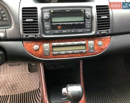 Синій Тойота Камрі, об'ємом двигуна 3 л та пробігом 265 тис. км за 7200 $, фото 69 на Automoto.ua