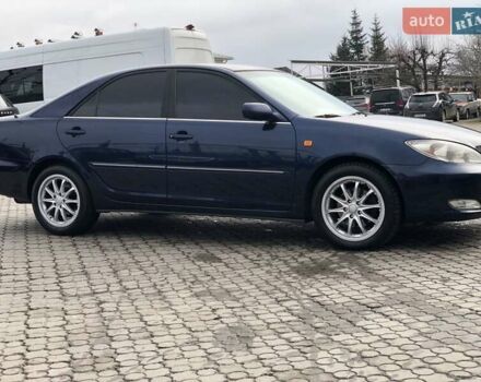 Синій Тойота Камрі, об'ємом двигуна 3 л та пробігом 265 тис. км за 7200 $, фото 5 на Automoto.ua