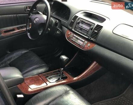 Синій Тойота Камрі, об'ємом двигуна 3 л та пробігом 265 тис. км за 7200 $, фото 74 на Automoto.ua