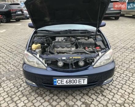 Синій Тойота Камрі, об'ємом двигуна 3 л та пробігом 265 тис. км за 7200 $, фото 71 на Automoto.ua