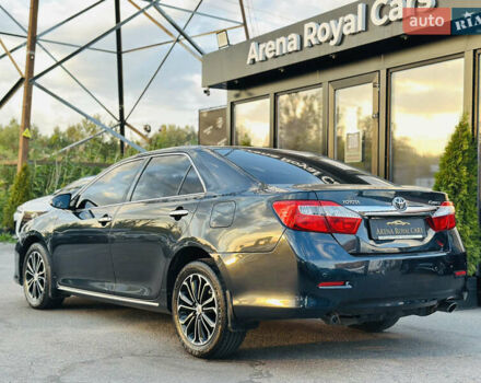 Синій Тойота Камрі, об'ємом двигуна 2.49 л та пробігом 231 тис. км за 12700 $, фото 11 на Automoto.ua