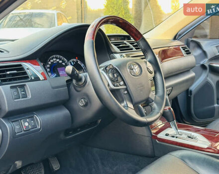 Синій Тойота Камрі, об'ємом двигуна 2.49 л та пробігом 231 тис. км за 12700 $, фото 13 на Automoto.ua