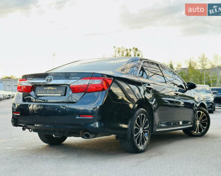Синій Тойота Камрі, об'ємом двигуна 2.49 л та пробігом 231 тис. км за 12700 $, фото 1 на Automoto.ua