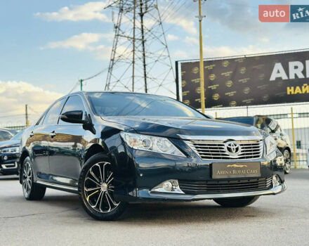 Синій Тойота Камрі, об'ємом двигуна 2.49 л та пробігом 231 тис. км за 12700 $, фото 2 на Automoto.ua