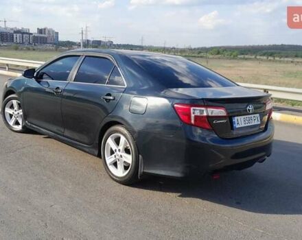 Синий Тойота Камри, объемом двигателя 2.5 л и пробегом 225 тыс. км за 11900 $, фото 1 на Automoto.ua