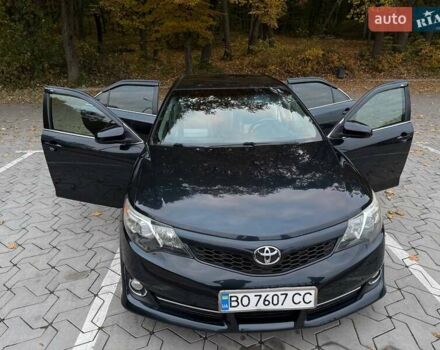 Синий Тойота Камри, объемом двигателя 2.49 л и пробегом 247 тыс. км за 14000 $, фото 1 на Automoto.ua