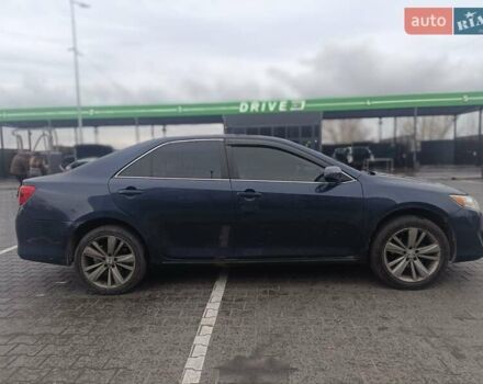 Синий Тойота Камри, объемом двигателя 2.5 л и пробегом 157 тыс. км за 12000 $, фото 2 на Automoto.ua