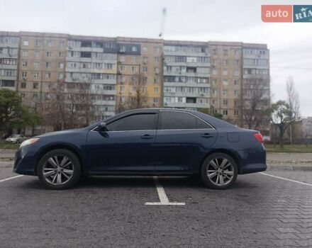 Синий Тойота Камри, объемом двигателя 2.5 л и пробегом 157 тыс. км за 12000 $, фото 1 на Automoto.ua