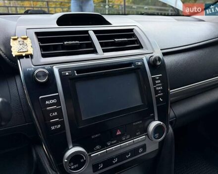 Синий Тойота Камри, объемом двигателя 2.49 л и пробегом 247 тыс. км за 14000 $, фото 29 на Automoto.ua