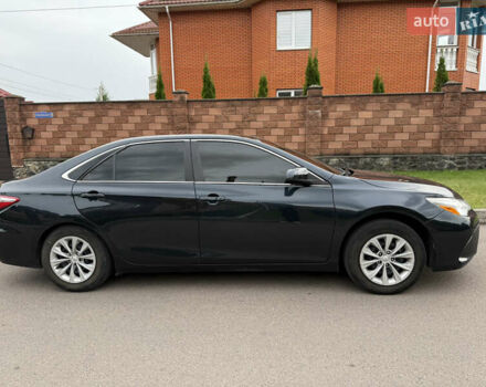 Синій Тойота Камрі, об'ємом двигуна 2.49 л та пробігом 205 тис. км за 13500 $, фото 2 на Automoto.ua