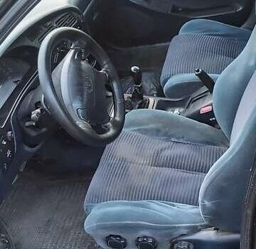 Синий Тойота Камри, объемом двигателя 2.2 л и пробегом 646 тыс. км за 1500 $, фото 1 на Automoto.ua