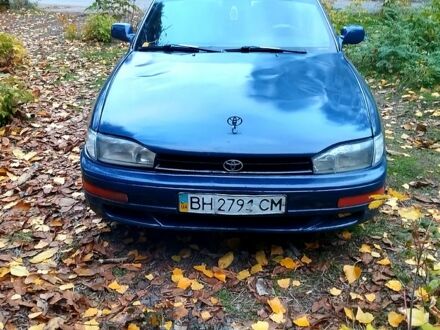 Синій Тойота Камрі, об'ємом двигуна 2.2 л та пробігом 123 тис. км за 1300 $, фото 1 на Automoto.ua