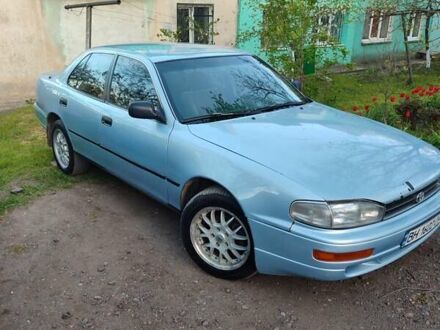 Синий Тойота Камри, объемом двигателя 2.16 л и пробегом 370 тыс. км за 2200 $, фото 1 на Automoto.ua