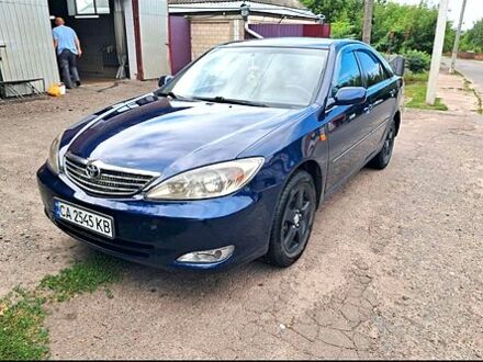 Синий Тойота Камри, объемом двигателя 3 л и пробегом 350 тыс. км за 5300 $, фото 1 на Automoto.ua