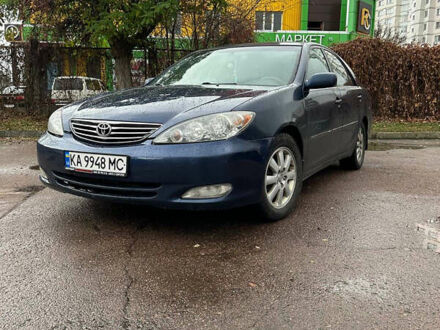 Синий Тойота Камри, объемом двигателя 2.4 л и пробегом 233 тыс. км за 5200 $, фото 1 на Automoto.ua