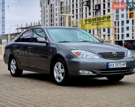 Синий Тойота Камри, объемом двигателя 3 л и пробегом 323 тыс. км за 5600 $, фото 1 на Automoto.ua
