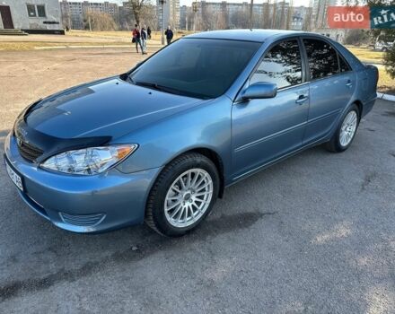 Синий Тойота Камри, объемом двигателя 2.4 л и пробегом 275 тыс. км за 5700 $, фото 1 на Automoto.ua