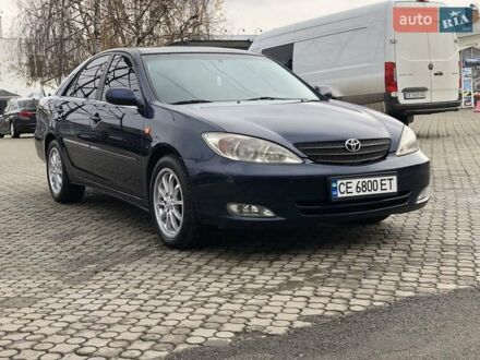 Синий Тойота Камри, объемом двигателя 3 л и пробегом 265 тыс. км за 7200 $, фото 1 на Automoto.ua