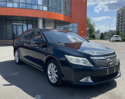 Синий Тойота Камри, объемом двигателя 2.5 л и пробегом 216 тыс. км за 13199 $, фото 1 на Automoto.ua