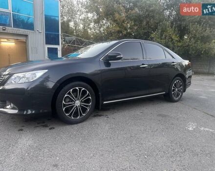 Синій Тойота Камрі, об'ємом двигуна 2.5 л та пробігом 173 тис. км за 13500 $, фото 1 на Automoto.ua