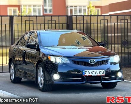 Синий Тойота Камри, объемом двигателя 2.5 л и пробегом 236 тыс. км за 12050 $, фото 1 на Automoto.ua