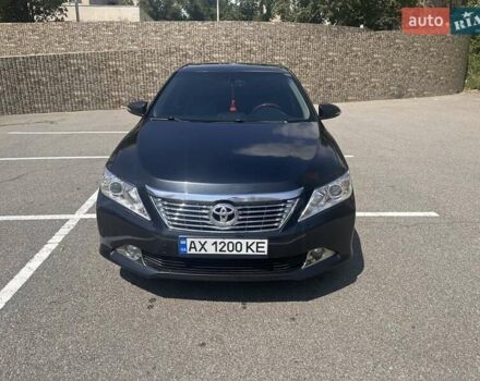 Синий Тойота Камри, объемом двигателя 2.49 л и пробегом 233 тыс. км за 13000 $, фото 1 на Automoto.ua