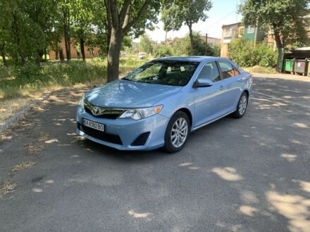 Синий Тойота Камри, объемом двигателя 2.5 л и пробегом 140 тыс. км за 14000 $, фото 1 на Automoto.ua