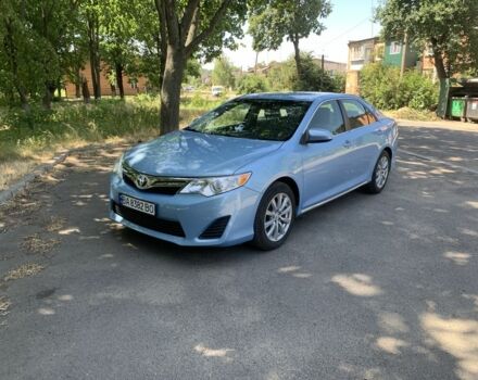 Синий Тойота Камри, объемом двигателя 2.5 л и пробегом 140 тыс. км за 14000 $, фото 1 на Automoto.ua