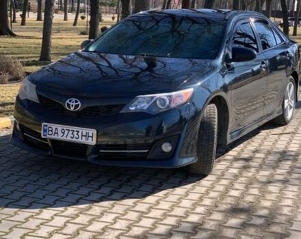 Синий Тойота Камри, объемом двигателя 2.5 л и пробегом 157 тыс. км за 12500 $, фото 1 на Automoto.ua