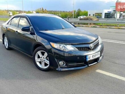 Синий Тойота Камри, объемом двигателя 2.5 л и пробегом 225 тыс. км за 11900 $, фото 1 на Automoto.ua