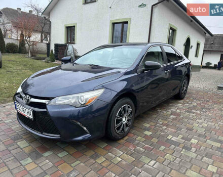Синий Тойота Камри, объемом двигателя 2.49 л и пробегом 240 тыс. км за 10500 $, фото 1 на Automoto.ua