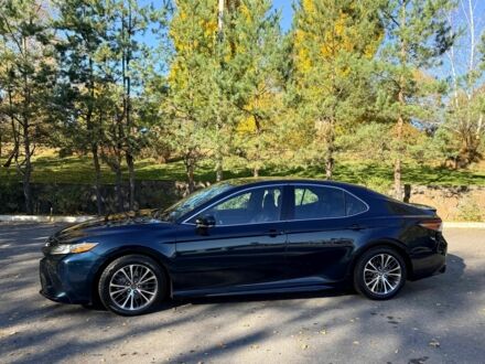 Синій Тойота Камрі, об'ємом двигуна 2.5 л та пробігом 124 тис. км за 23300 $, фото 1 на Automoto.ua